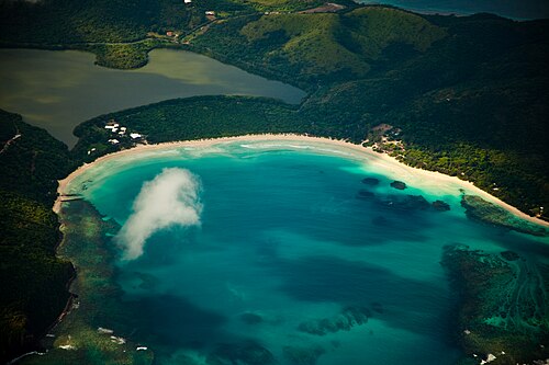 Wide pale sand and turquoise water at Flamenco Beach on Culebra
